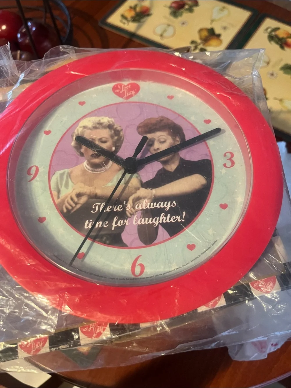 Red Retro-Style Wall Clock with Classic TV Duo Design